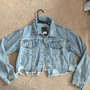 Womens cropped distressed blue jean jacket size S